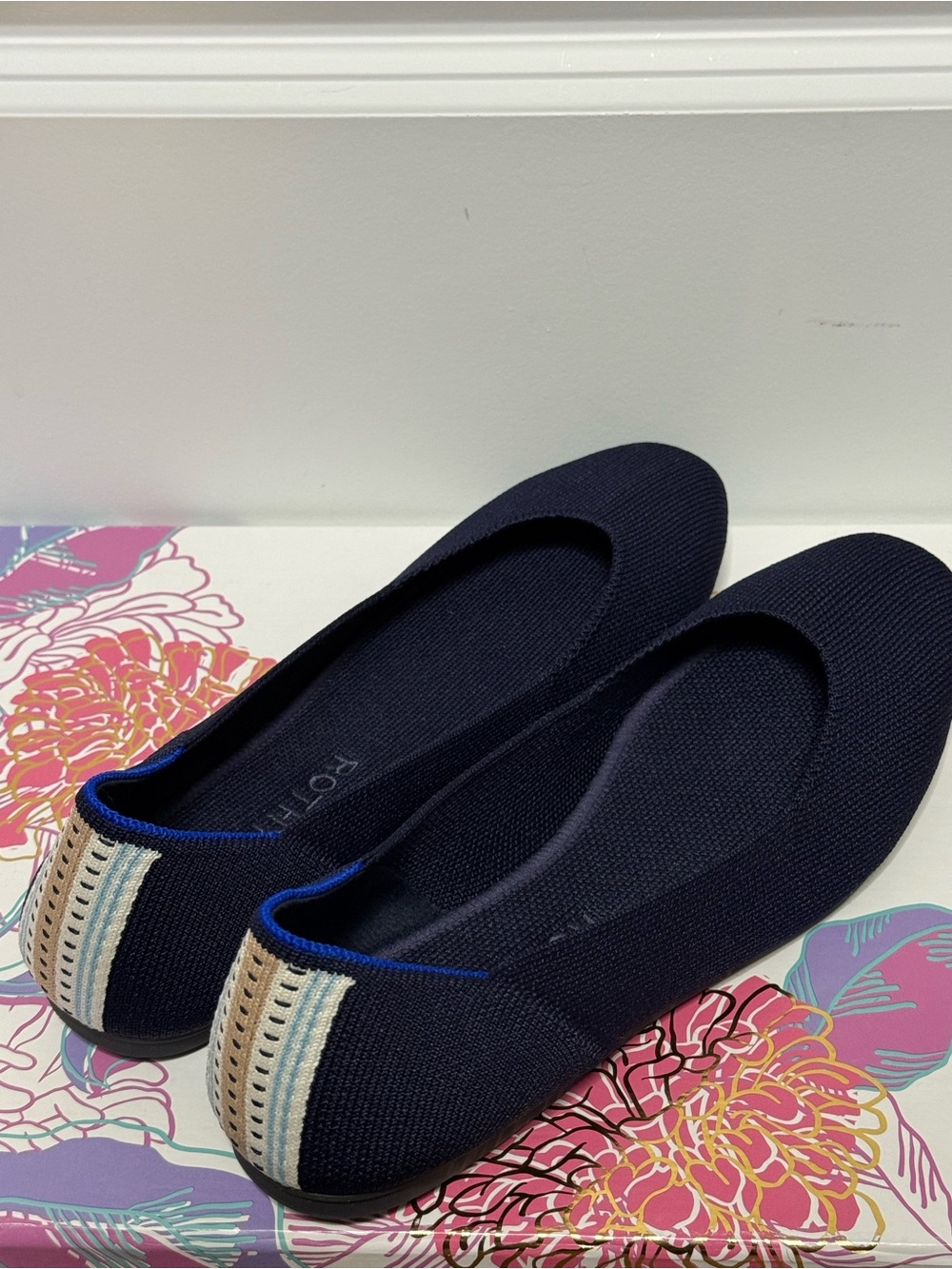Rothy's Navy Knit  Flats with Striped Heel Accent